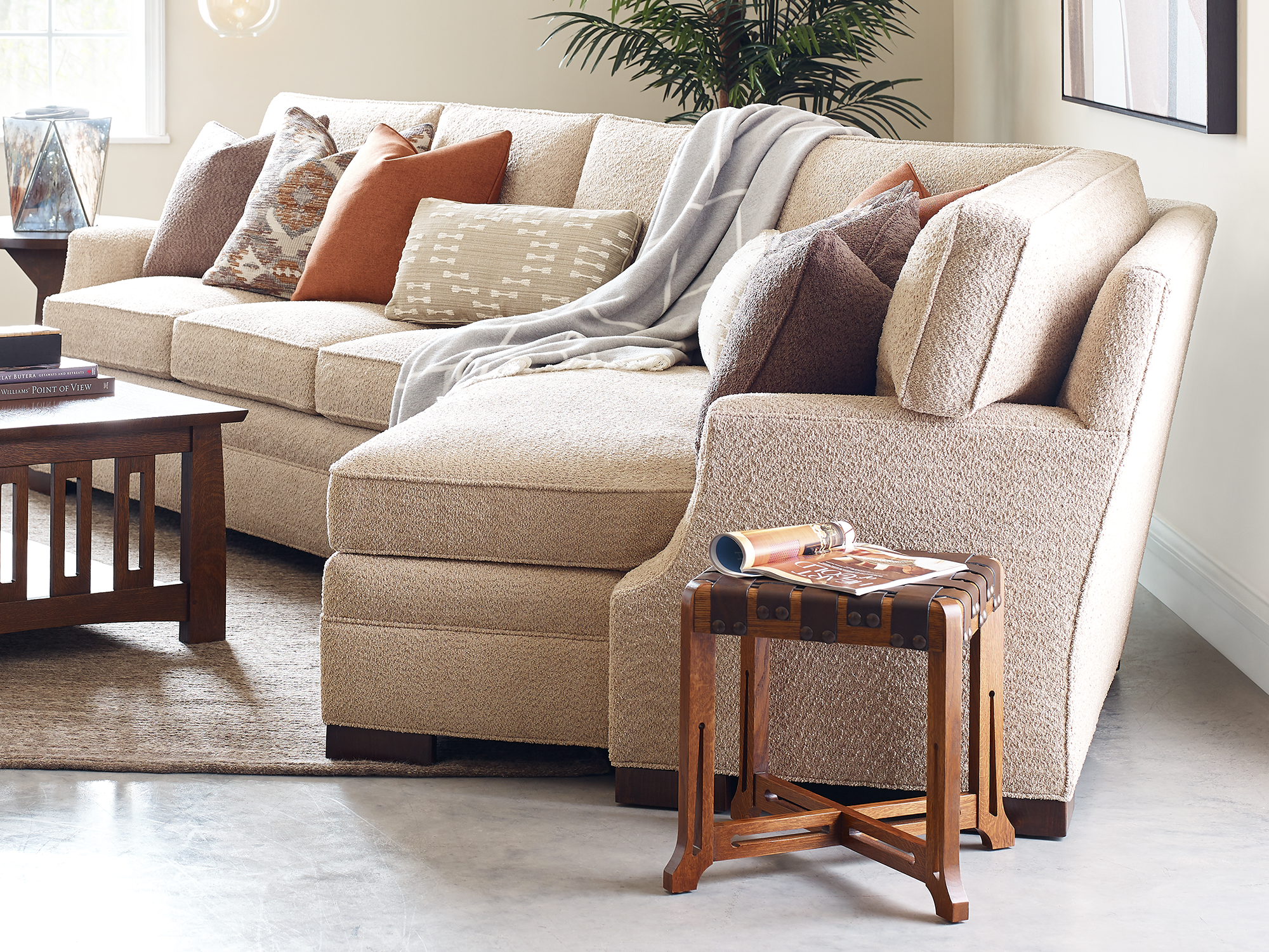 Selectionals by Stickley — 7000 Series large L-shaped upholstered sectional sofa in a neutral fabric with plush back cushions and dark wood feet.