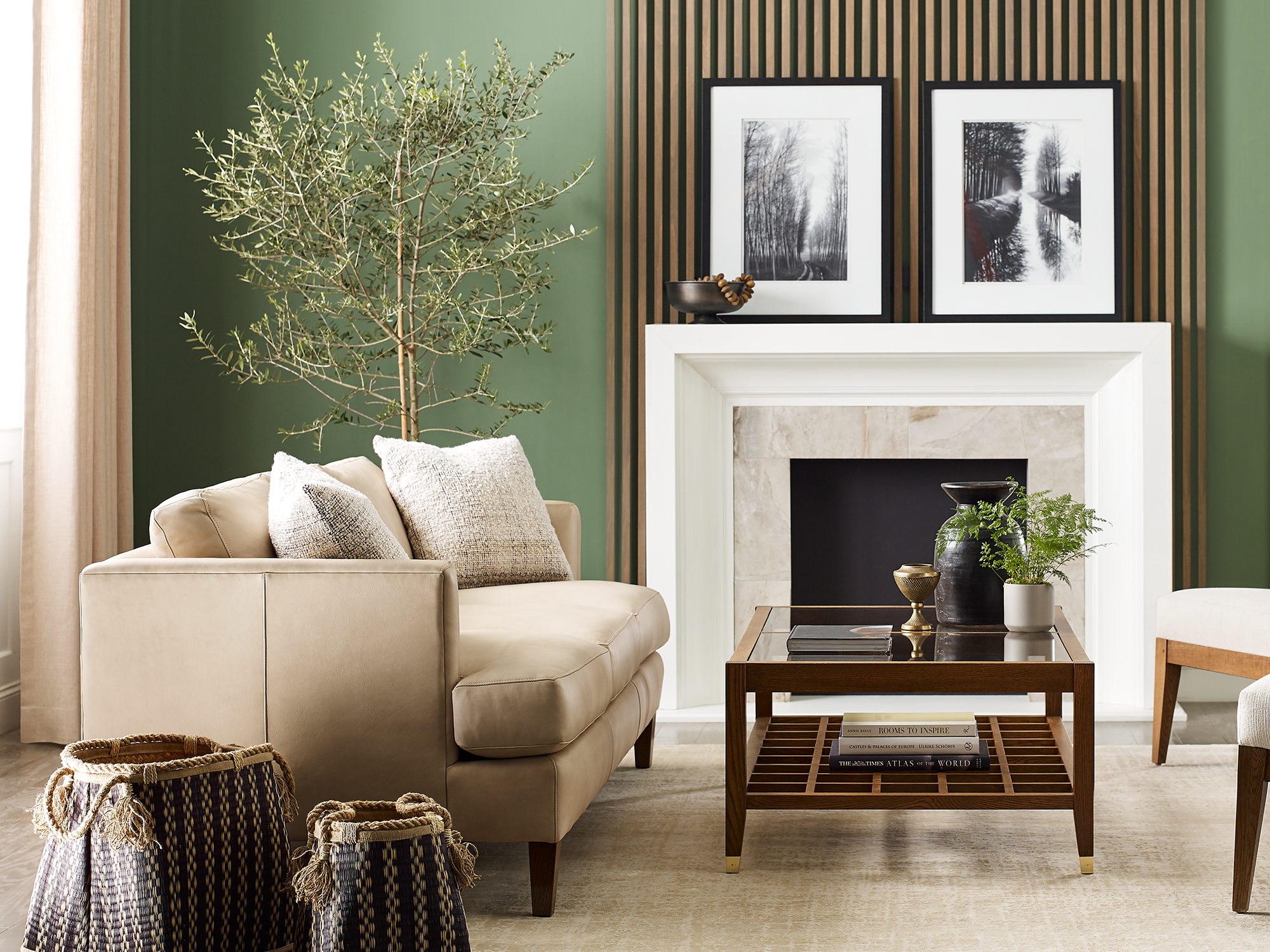 Stickley Surrey Hills Collection — Mission-inspired solid oak living room furniture featuring a wood-slat sofa with green upholstery and a matching coffee table.