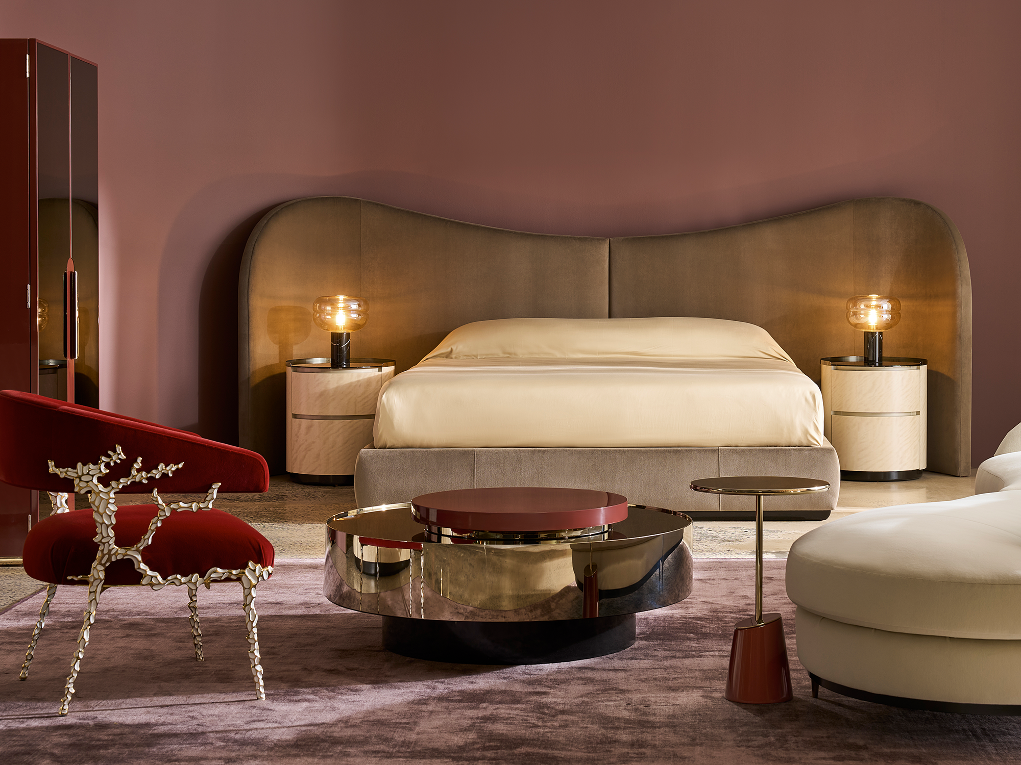 Caracole Classic — luxury Clio King bed featuring an extra-wide undulating headboard in Dark Taupe velvet on a Dark Chocolate plinth base.
