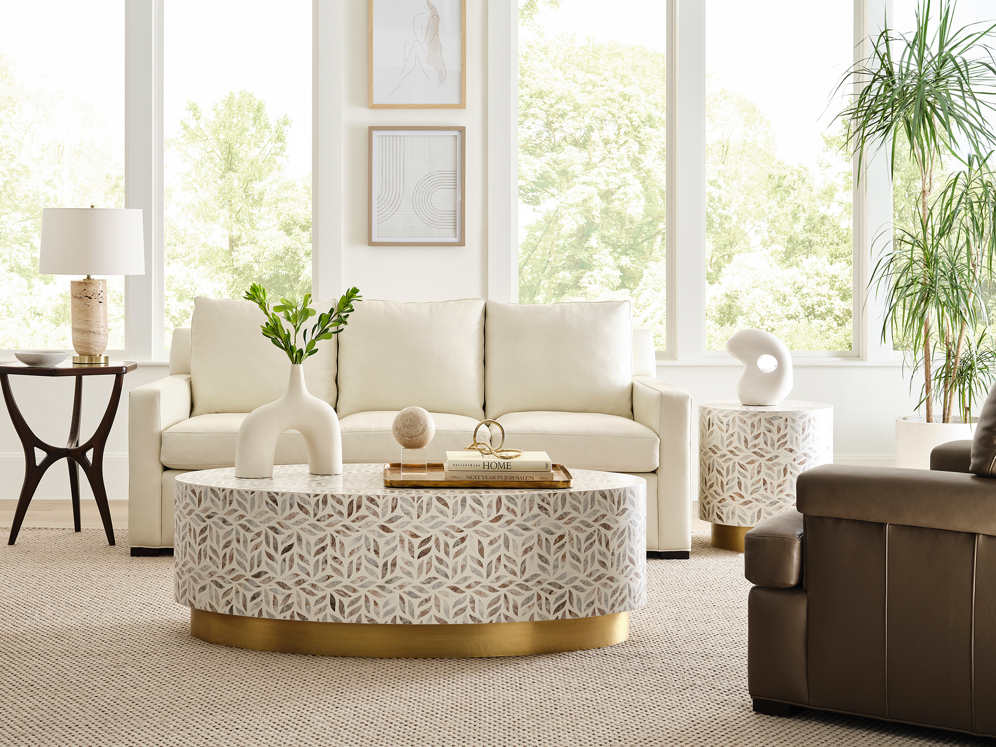 Hancock & Moore Your Way Modern — bright contemporary living room featuring a cream tailored-track arm sofa, a bone-inlay oval coffee table with a brass base, and an olive-toned leather recliner.