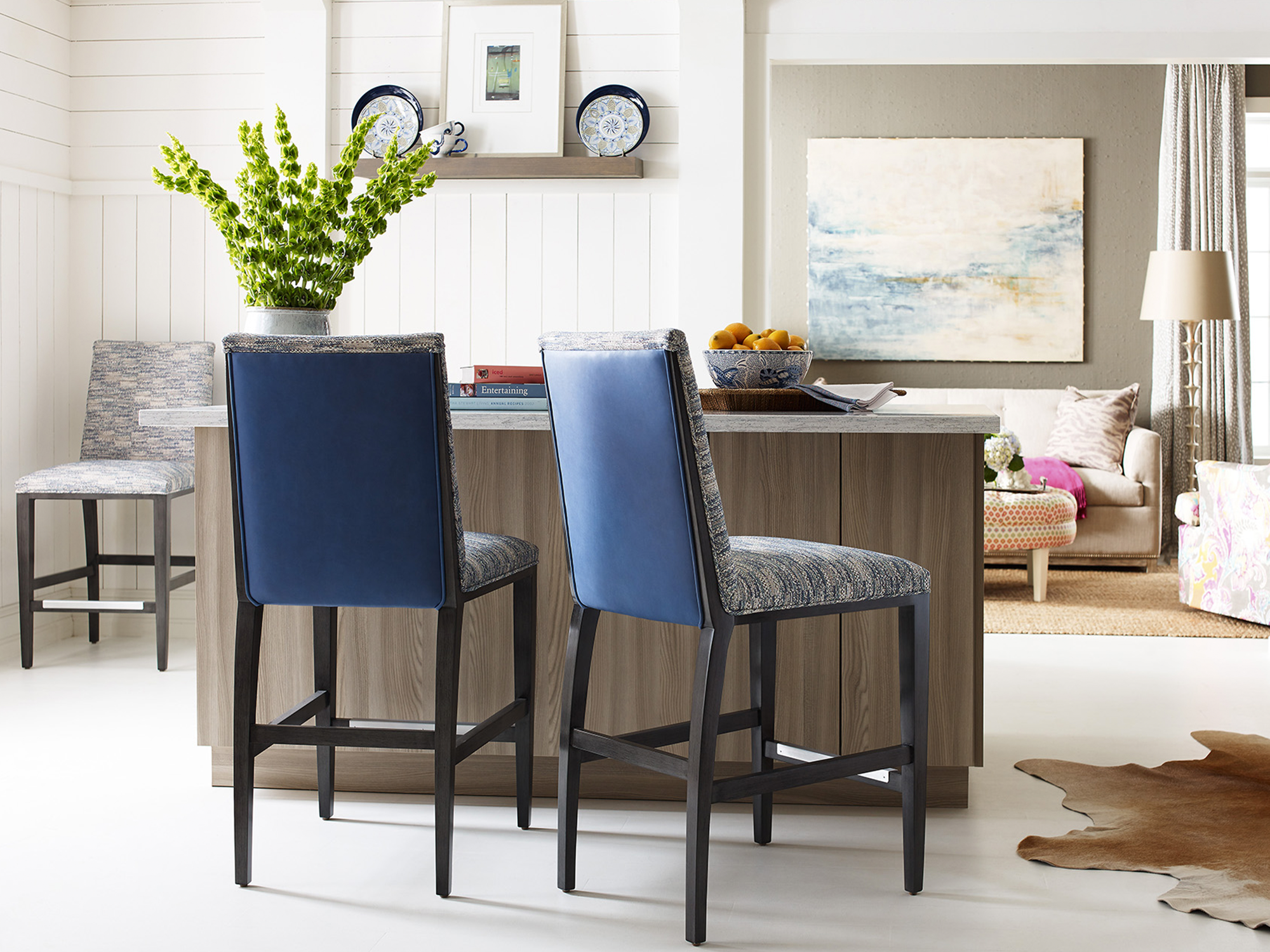 Jessica Charles — an elegant, tailored bar or counter stool that mirrors the classic comfort of an armchair while being elevated for a kitchen island or home bar.