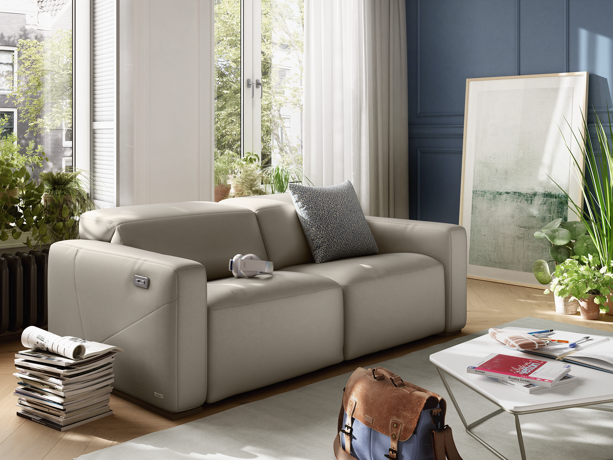 Natuzzi Italia Baltimora — modern, low-profile leather loveseat in a light pebble grey, featuring deep boxy cushions, wide track arms with integrated power motion controls, and a subtle wood-trim base.